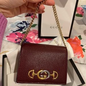 Gucci Horsebit card case wallet with chain .
